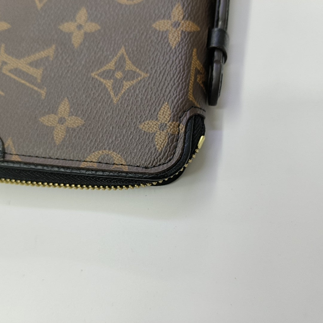Monogram Coated Canvas Clutch Brown
