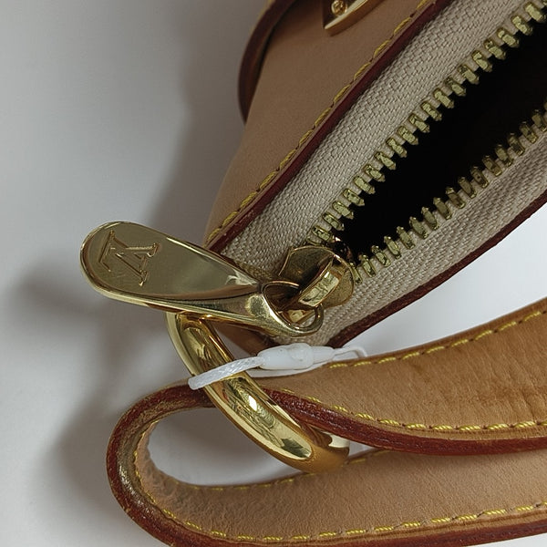LV × TM GRETA Monogram Coated Canvas White