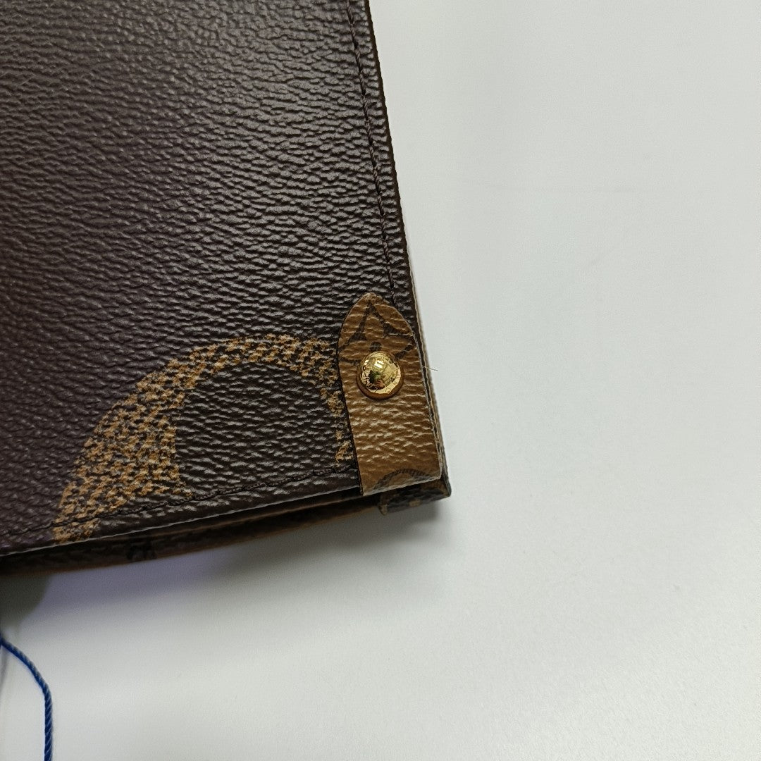 ONTHEGO MM Monogram Coated Canvas Brown