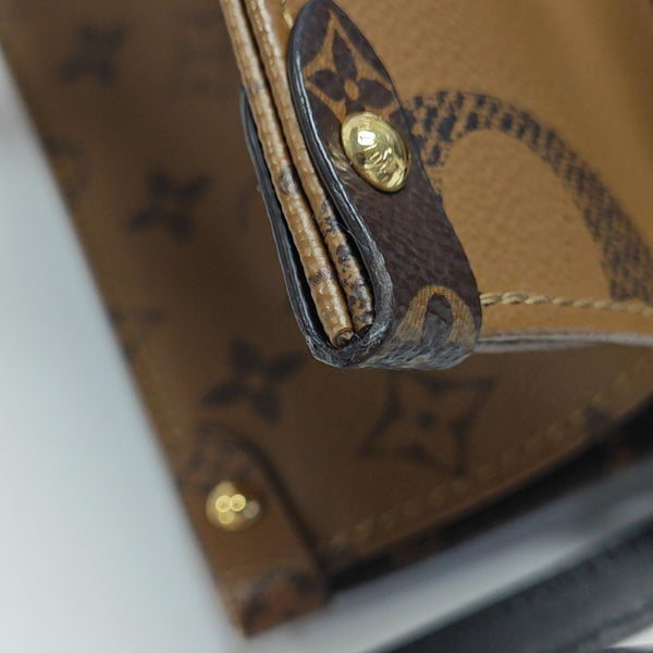ONTHEGO MM Monogram Coated Canvas Brown