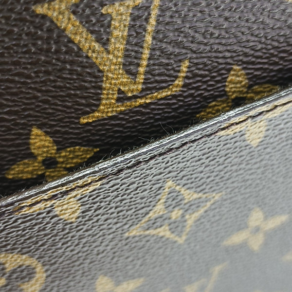 Monogram Coated Canvas Clutch Brown