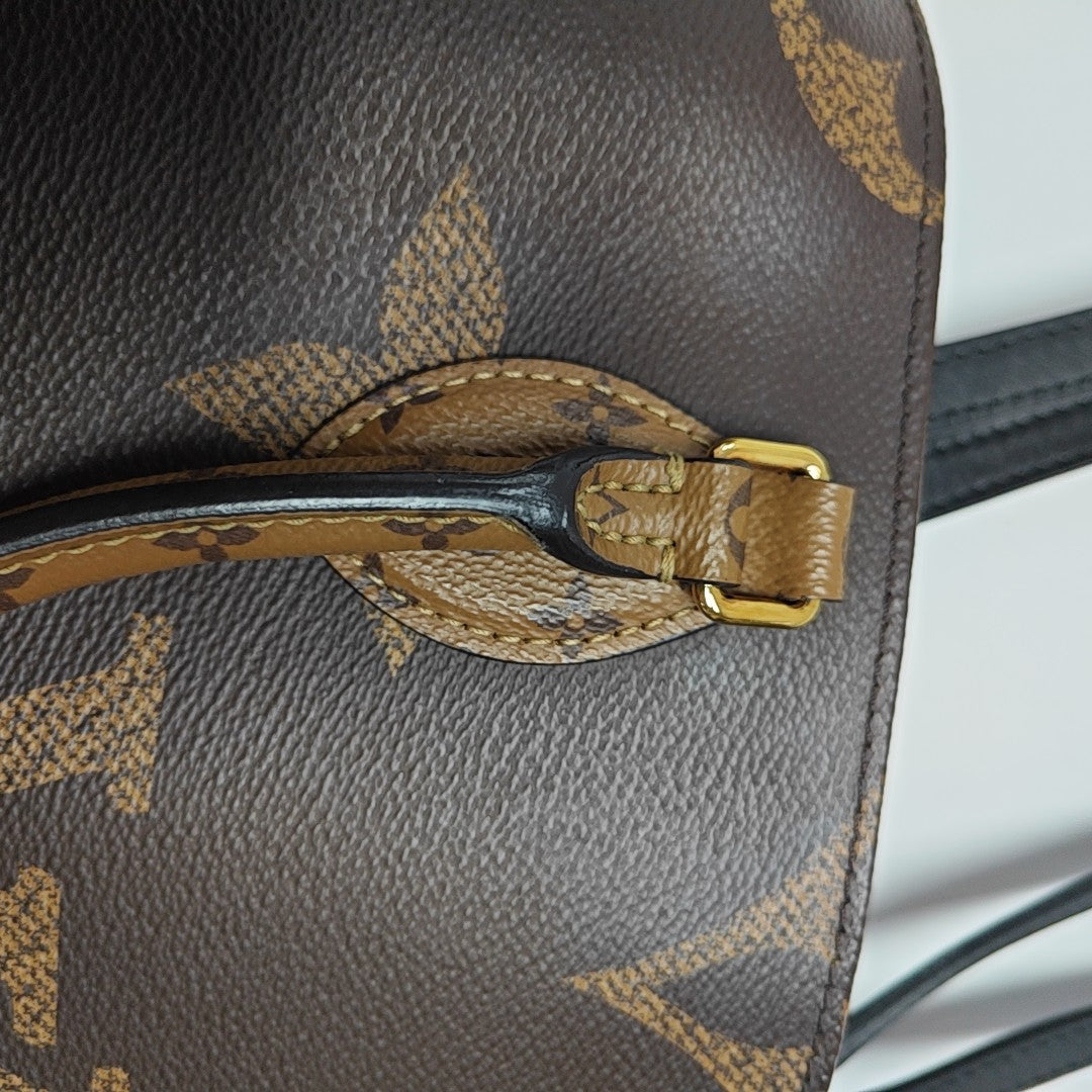 ONTHEGO MM Monogram Coated Canvas Brown