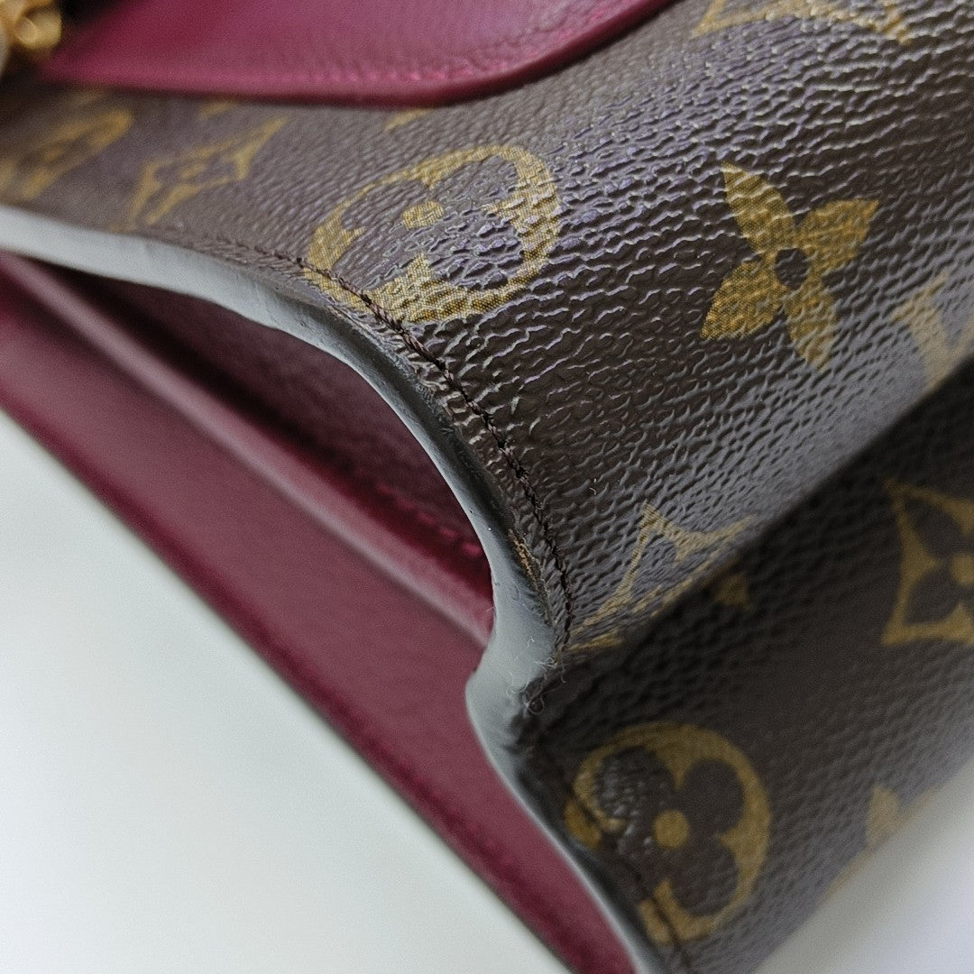 VICTOIRE Monogram Coated Canvas Brown