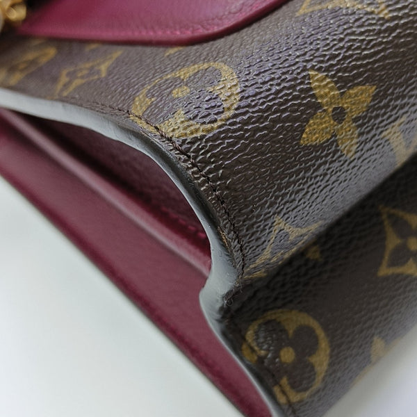 VICTOIRE Monogram Coated Canvas Brown