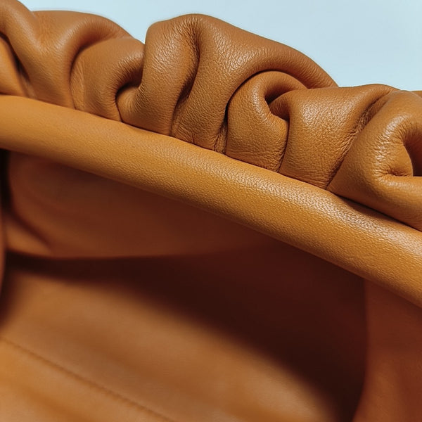 Authenticated pre-owned  The Pouch Mini Calfskin Orange - Crossbody Bag at Looply