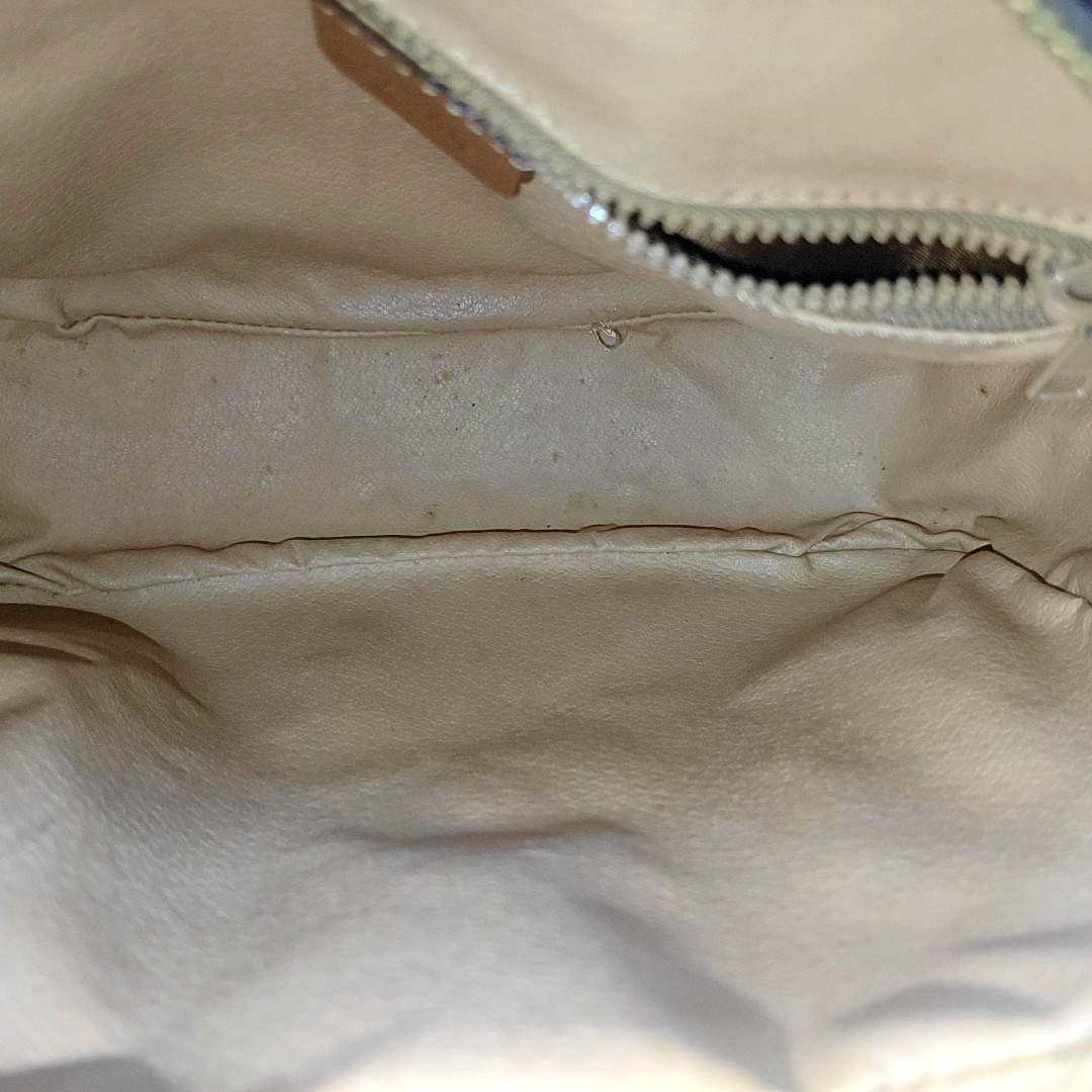 Authenticated pre-owned  MACADAM BLASON TRIOMPHE Coated Canvas Brown - Shoulder Bag at Looply