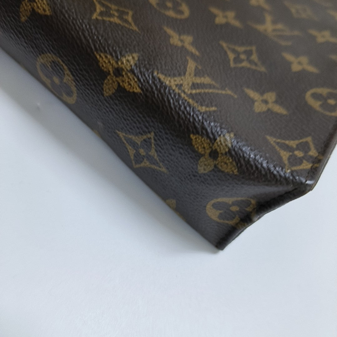 TOILET POCKET 26 Monogram Coated Canvas Brown