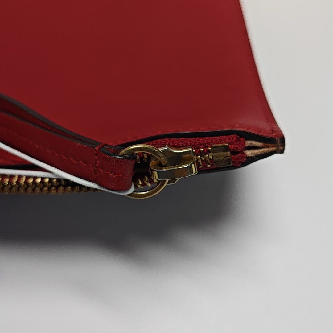 Monogram Coated Canvas Clutch Beige