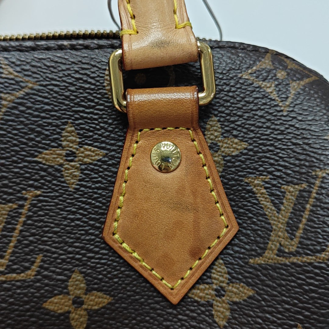 SPEEDY 20 Monogram Coated Canvas Brown