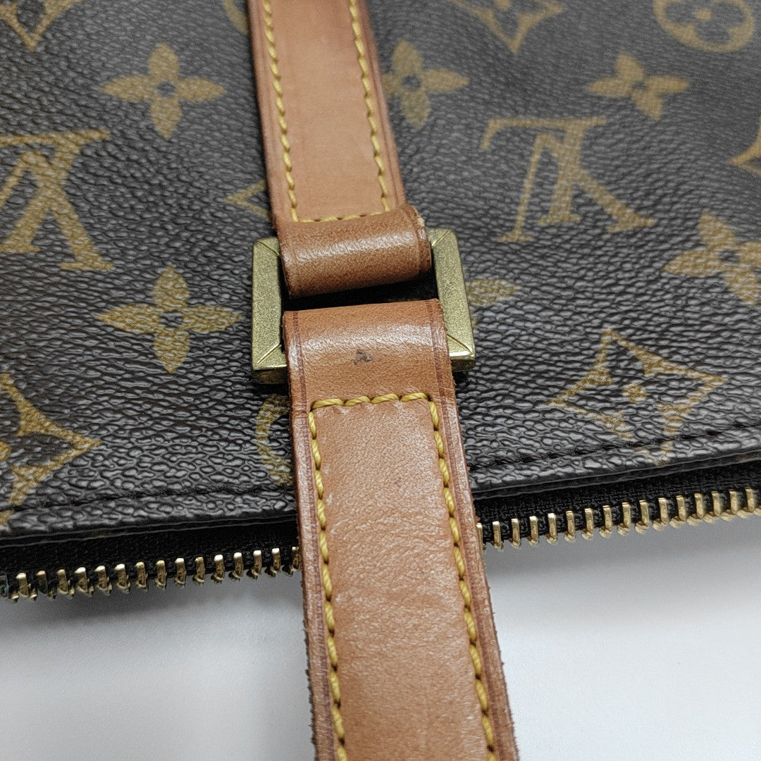 PIANO Monogram Coated Canvas Brown