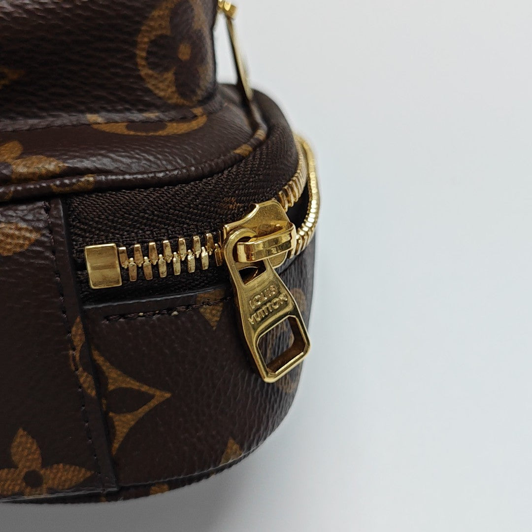 UTILITY Monogram Coated Canvas Brown
