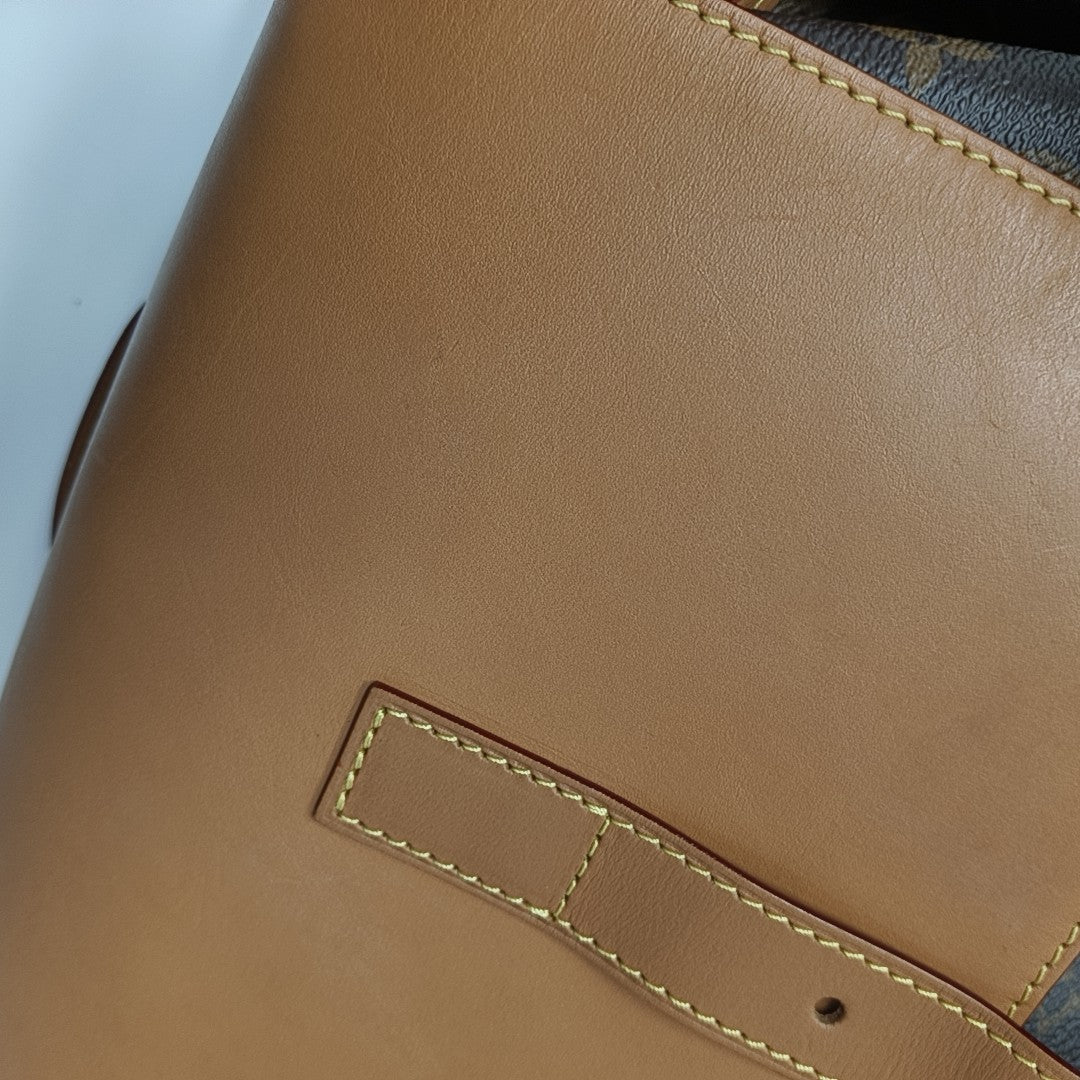 TRIO Monogram Coated Canvas Brown