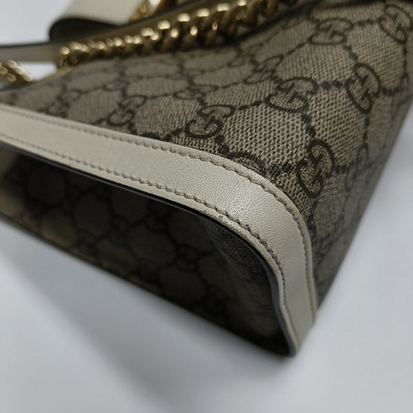 Padlock Small Monogram Coated Canvas Beige