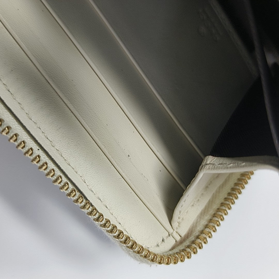Monogram Coated Canvas Wallet Brown