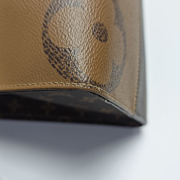 ONTHEGO MM Monogram Coated Canvas Brown