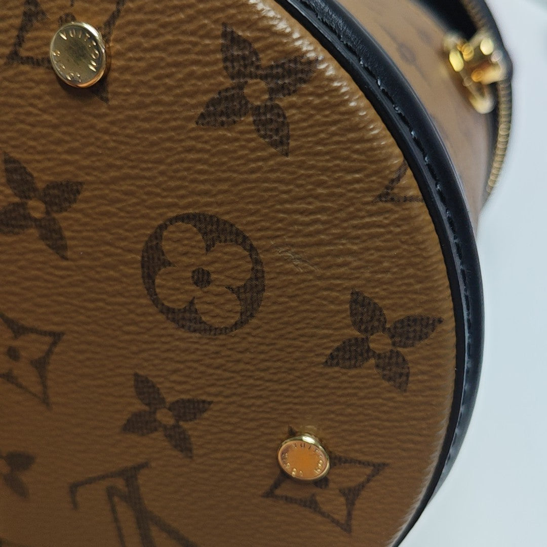 CANNES PM Monogram Coated Canvas Brown
