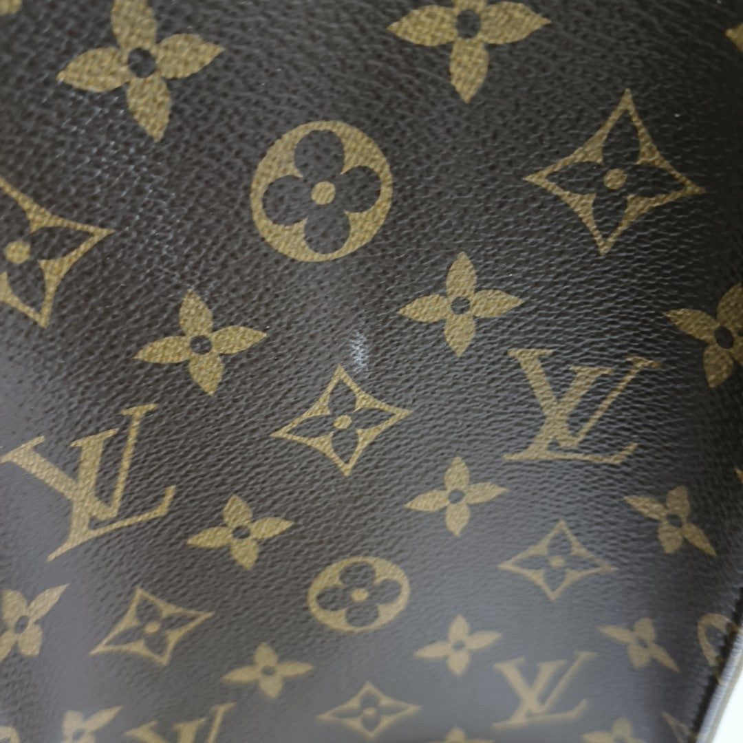 ONTHEGO MM Monogram Coated Canvas Brown