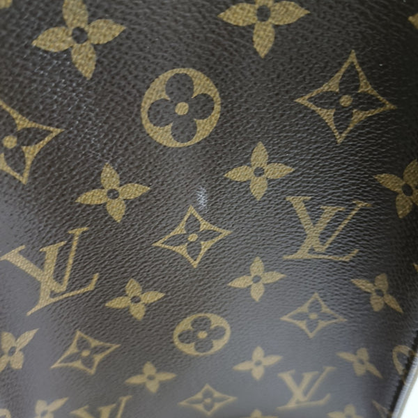 ONTHEGO MM Monogram Coated Canvas Brown