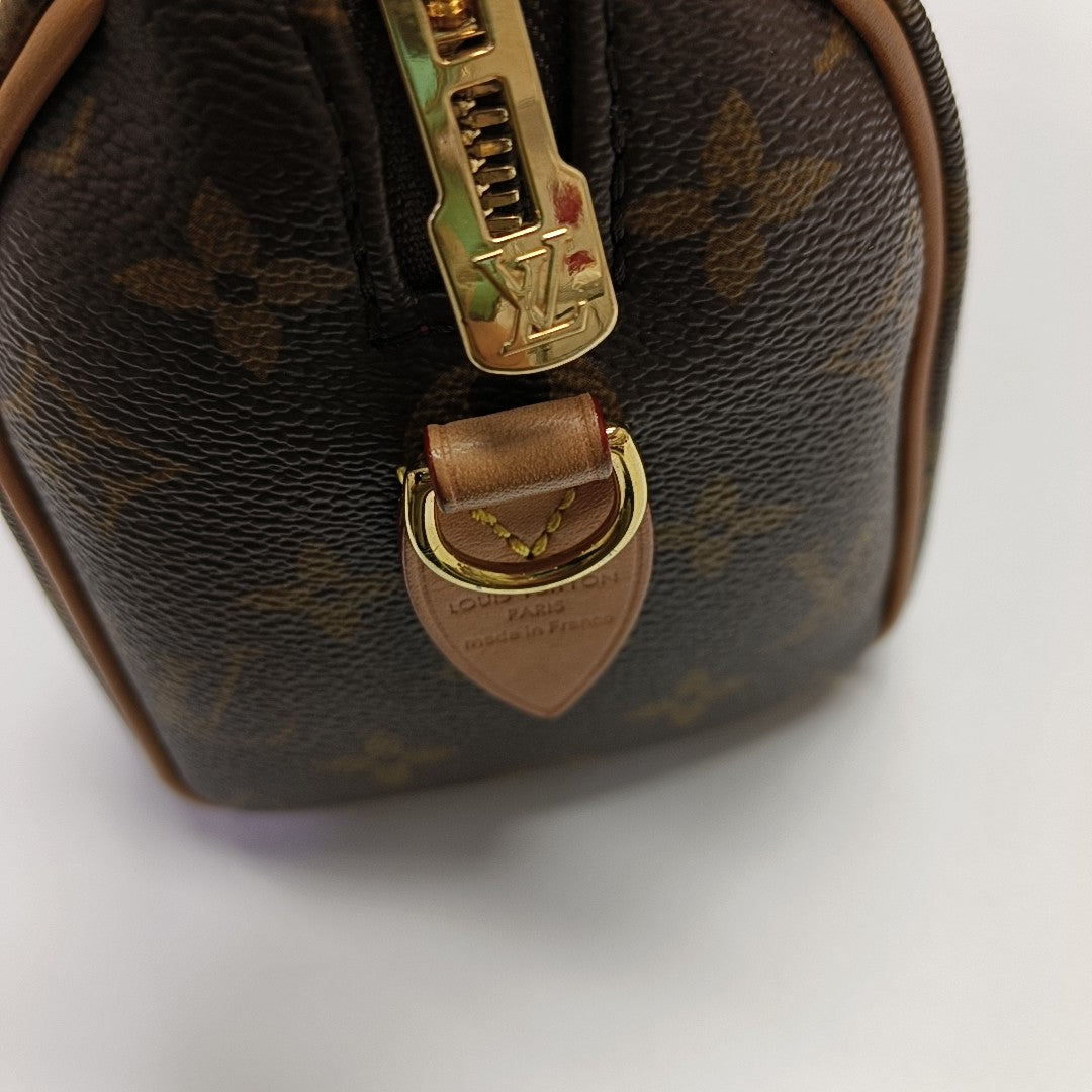 SPEEDY 20 Monogram Coated Canvas Brown