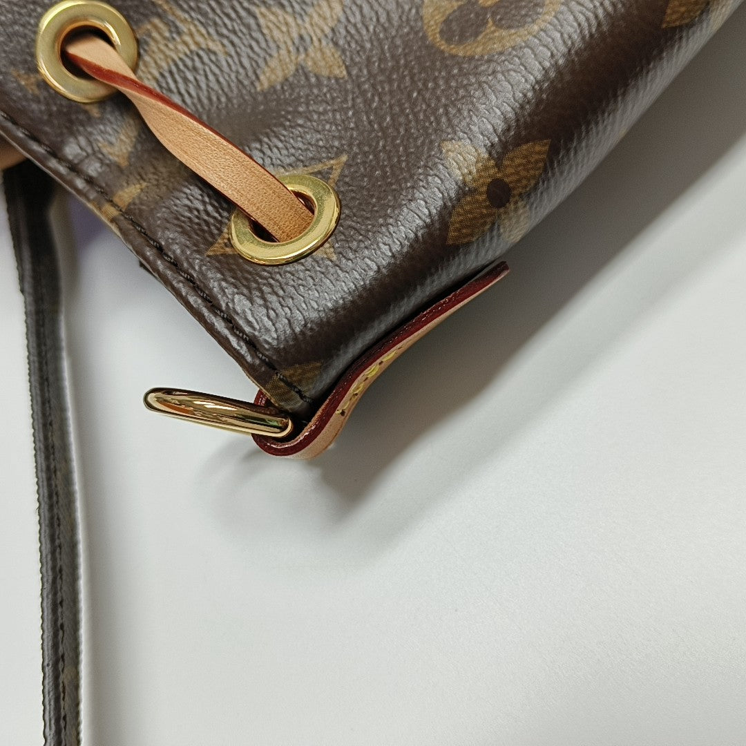 EXCURSION PM Monogram Coated Canvas Brown