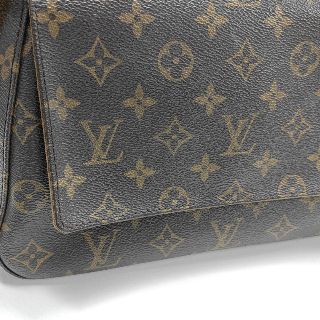 LOOPING PM Monogram Coated Canvas Brown