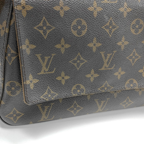 LOOPING PM Monogram Coated Canvas Brown