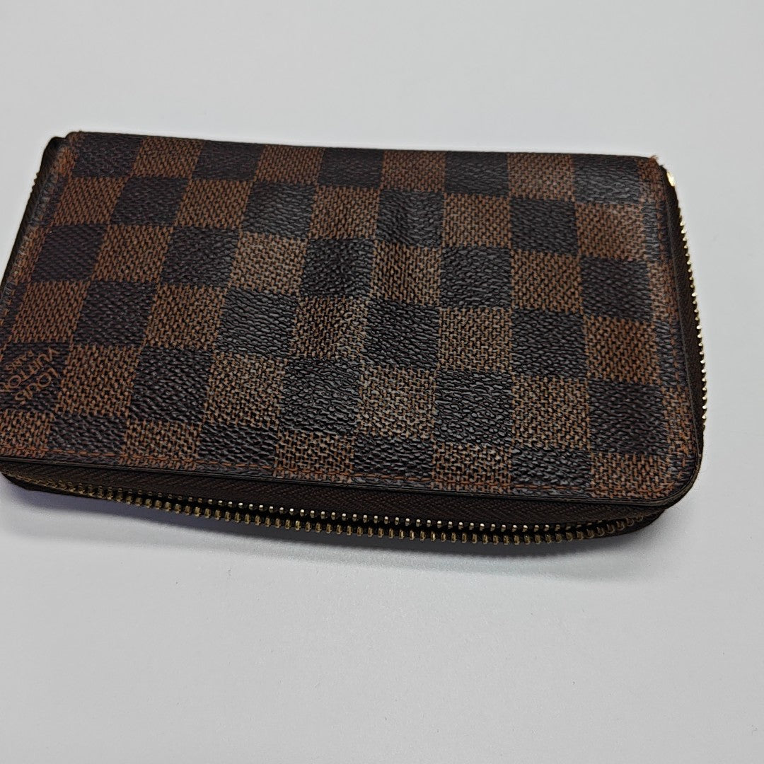 ZIPPY Damier Ebene Coated Canvas Brown Wallet