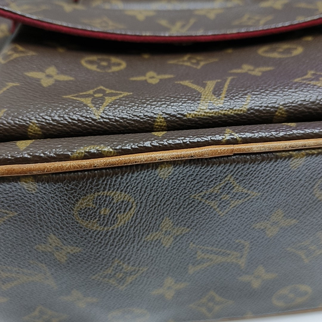 EXCENTRI-CITE Monogram Coated Canvas Brown