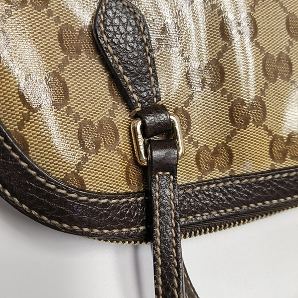 Dome Monogram Coated Canvas Brown