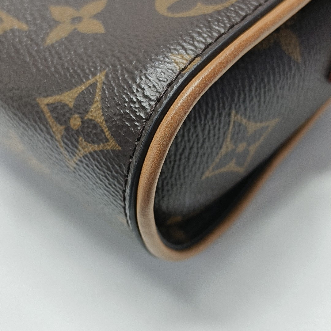 Pochette Camille Monogram Coated Canvas Brown