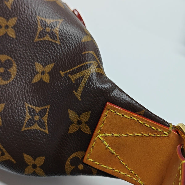 RUSH Monogram Coated Canvas Brown