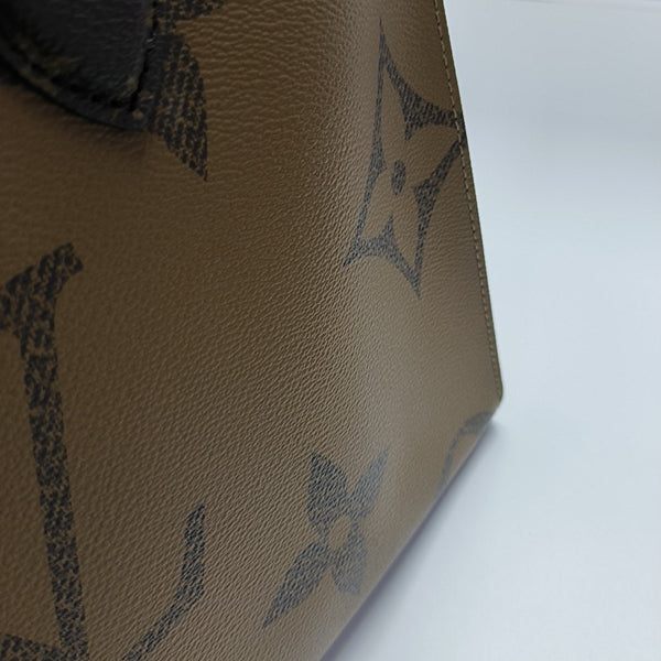 ONTHEGO MM Monogram Coated Canvas Brown