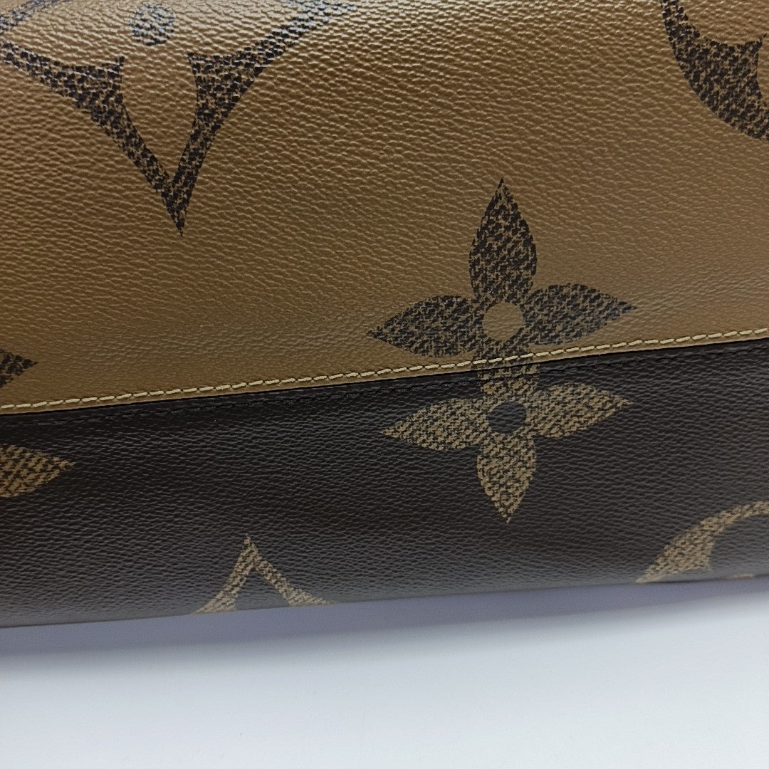 ONTHEGO GM Monogram Coated Canvas Brown