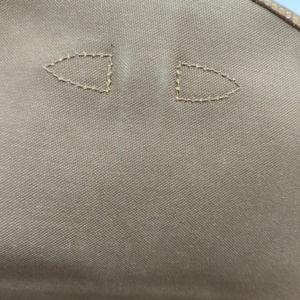 SAUMUR Monogram Coated Canvas Brown