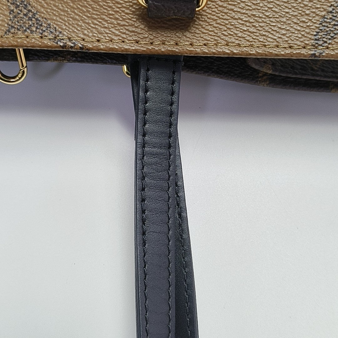 ONTHEGO MM Monogram Coated Canvas Brown