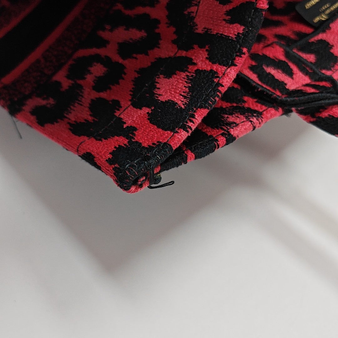 Authenticated pre-owned  Book Tote Medium Fabric Red - Tote Bag at Looply