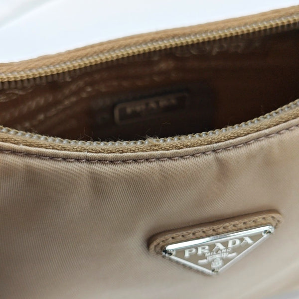 Authenticated pre-owned  Re-Edition2000 Mini Nylon Beige - Top Handle Bag at Looply