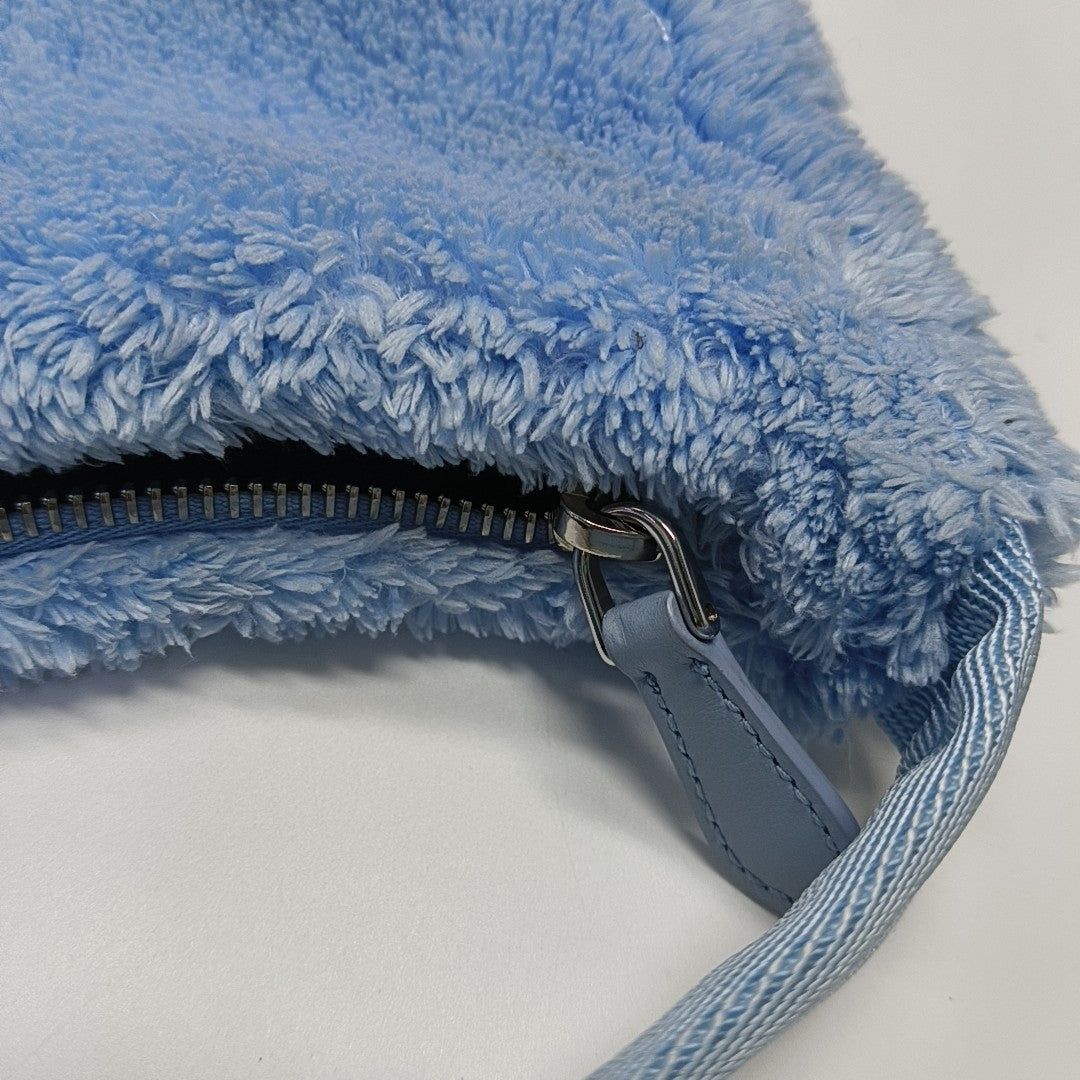 Authenticated pre-owned  Re-Edition2000 Mini Terry Cloth Blue - Top Handle Bag at Looply