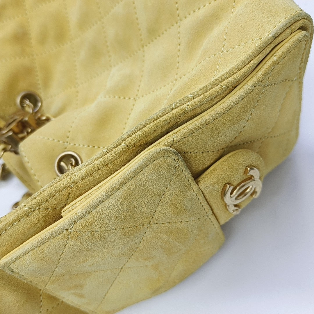 CHANEL 25 Quilted Suede Yellow