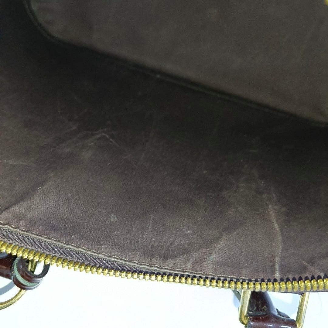 Authenticated pre-owned  ALMA PM Monogram Patent Leather Burgundy - Top Handle Bag at Looply