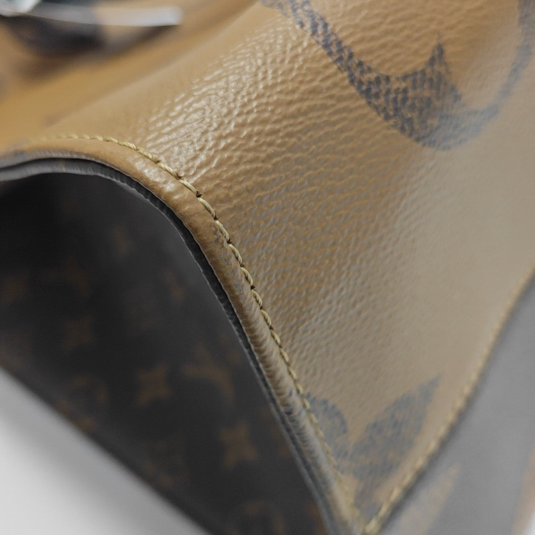 ONTHEGO GM Monogram Coated Canvas Brown