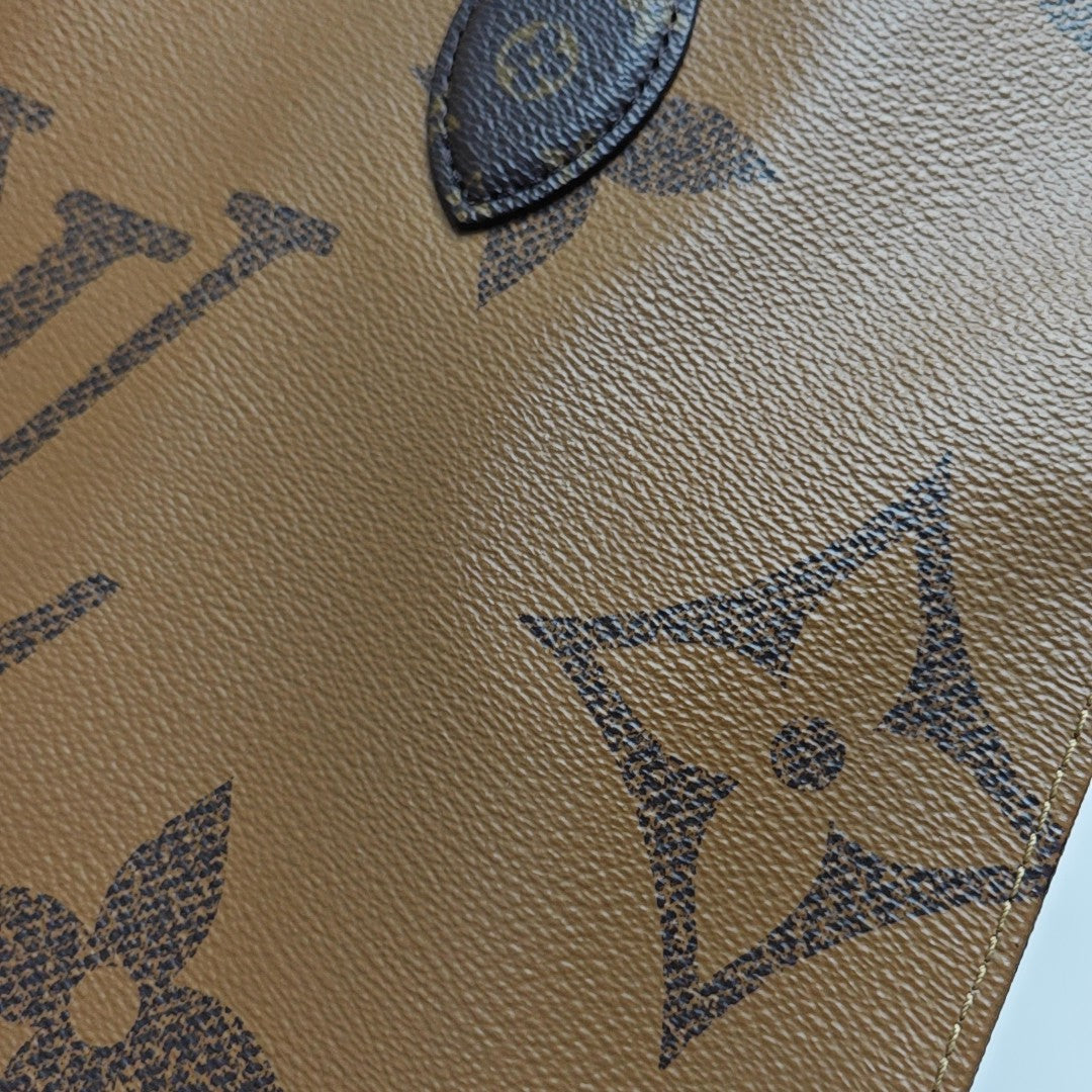 ONTHEGO MM Monogram Coated Canvas Brown