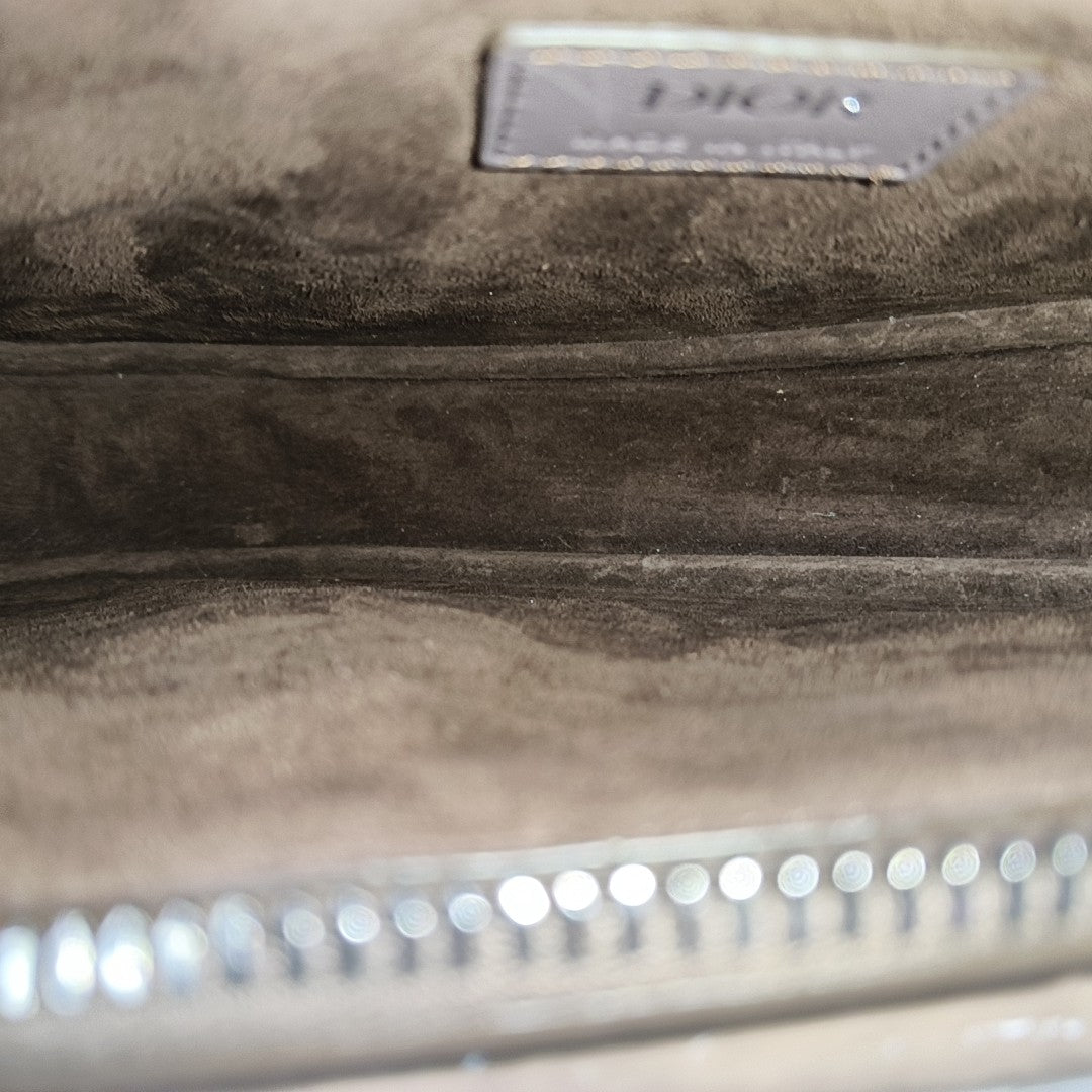 Authenticated pre-owned  Saddle Monogram Patent Leather Grey - Shoulder Bag at Looply
