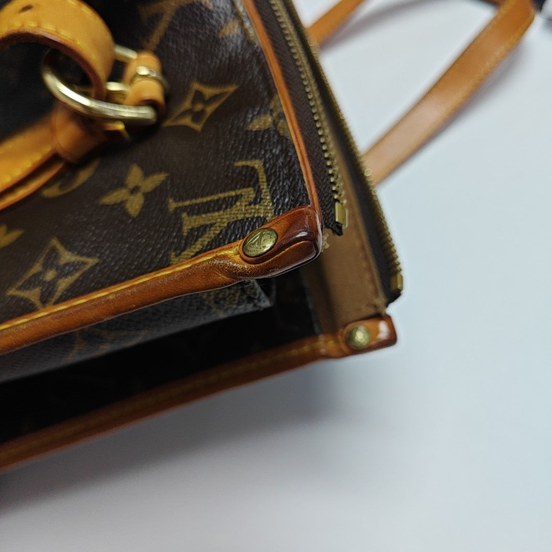 POPINCOURT Monogram Coated Canvas Brown