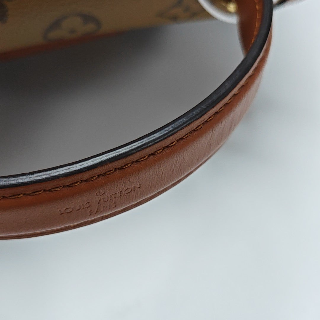 Monogram Coated Canvas PM Brown