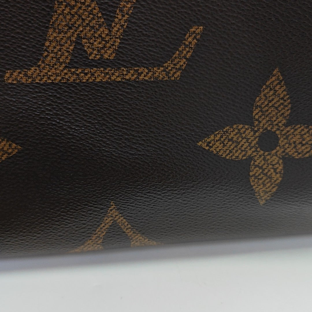 ONTHEGO MM Monogram Coated Canvas Brown