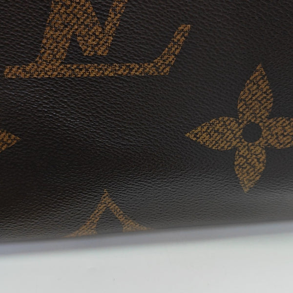 ONTHEGO MM Monogram Coated Canvas Brown