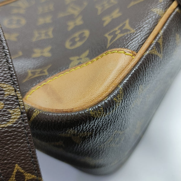 Nile Monogram Coated Canvas Brown