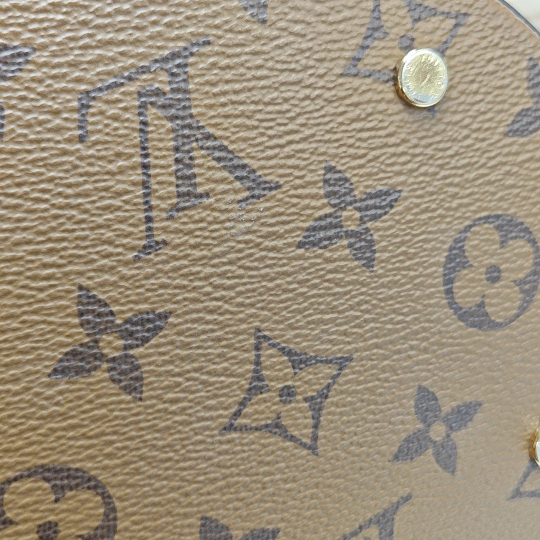 CANNES PM Monogram Coated Canvas Brown