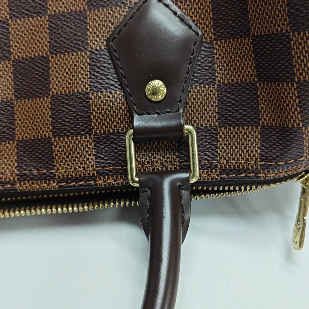 SPEEDY 25 Damier Ebene Coated Canvas Brown